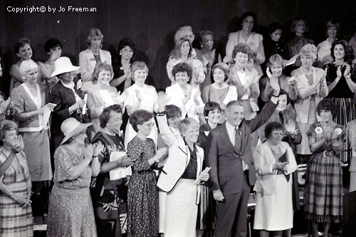 Mondale and Ferraro with an assembly of applauding women behind them