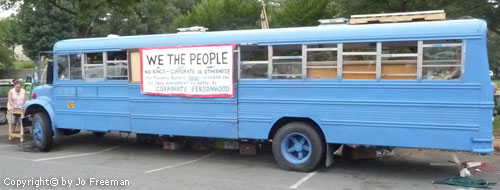 a repurposed school bus protests corprate personhood