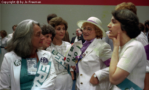 a group of women in heavy discussion