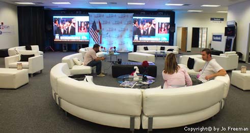 interior of the women up pavilion where people lounge on sofas