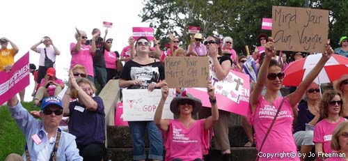 Code Pink protestors holding signs