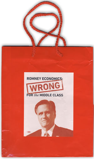 a shopping bag with an anti-Romney poster attached
