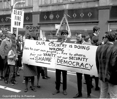 Protestors with banner