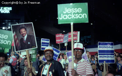 diverse signs for Mondale, Hart, and several prominent Jesse Jackson posters