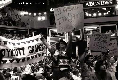 delegates display protest signs