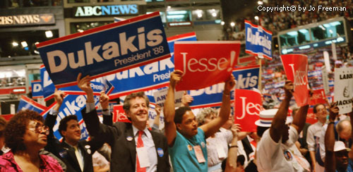 a mixture of Dukakis and Jackson signs in a crowd