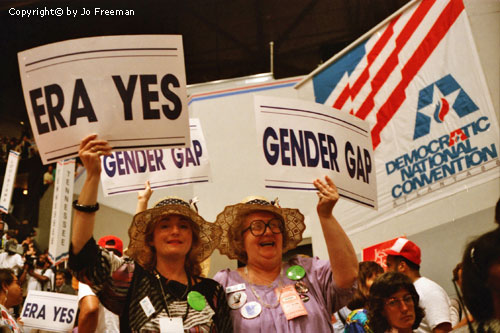 delegates display protest signs