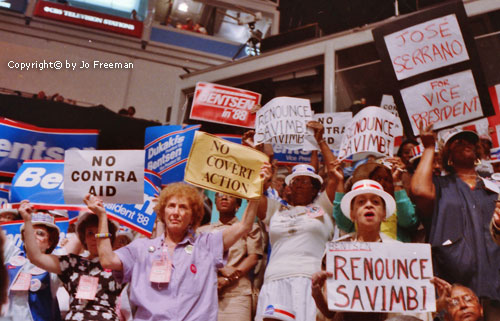 delegates display protest signs